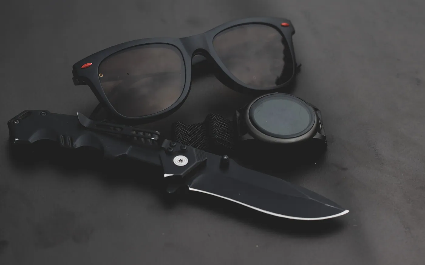 A folding knife, one of the few tools worth carrying on every dive