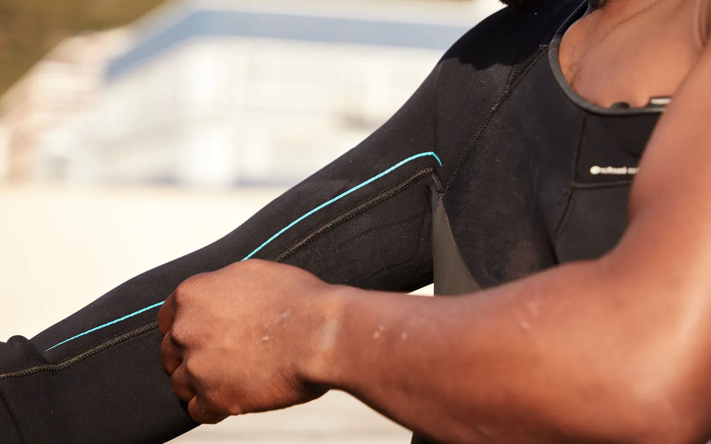 Close-up of a neoprene wetsuit sleeve and seam