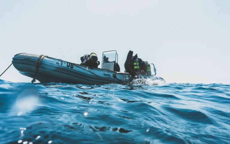 Divers aboard a rigid inflatable boat on open water